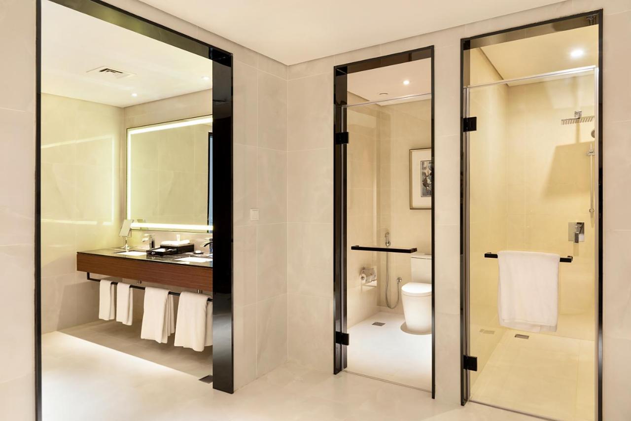 Asiana Grand Hotel Ντουμπάι Εξωτερικό φωτογραφία A bathroom with a shower room